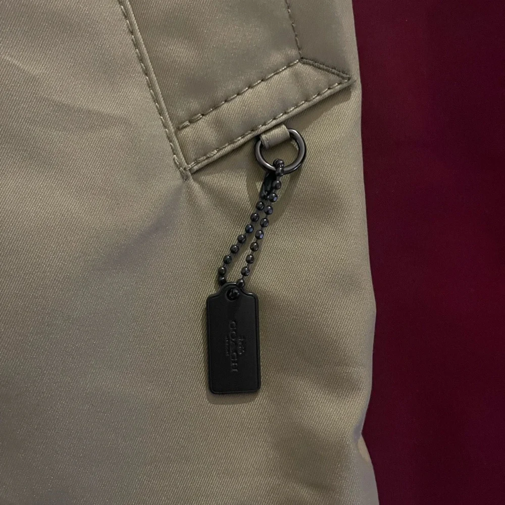I am listing a men’s Coach trench coat size large - Picture 2 of 10